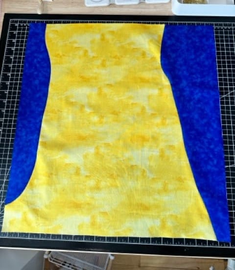 base printed quilting cotton layer of blue and yellow